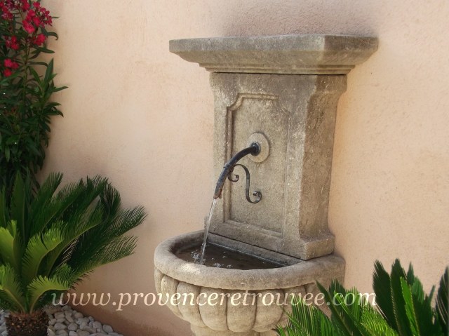 Installer une fontaine en pierre dans son jardin